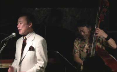 丸山繁雄 岡田勉